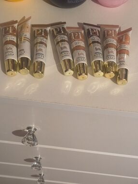 P Louise Lip  Base Gold-Capped Skincare Serums with White & Peach Tubes